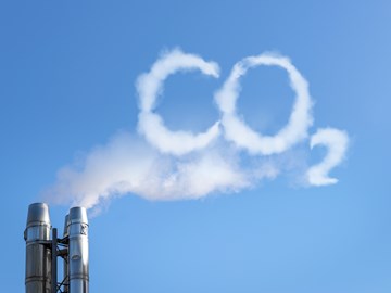 Rauch aus Schloten bildet den Begriff CO2 - Bildmontage Rauch aus Schloten bildet den Begriff CO2 - Bildmontage